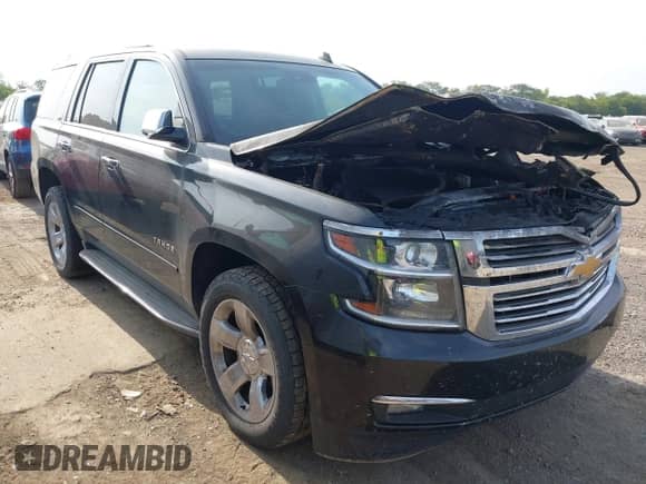 2015 Chevrolet Tahoe LTZ with VIN 1GNSKCKC1FR161948, listed as a IAAI auction lot 43222142 with Not provided miles and . Bid and sale history available at DreamBid. Image 1.