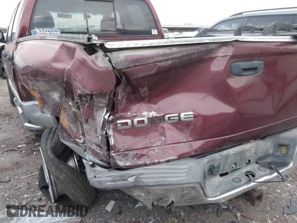 2002 Dodge 1500 with VIN 1D7HA18Z62S565455, listed as a IAAI auction lot 43038621 with 212,036 mi miles and . Bid and sale history available at DreamBid. Image 6.