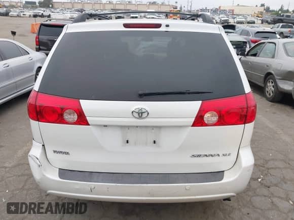 2009 Toyota Sienna XLE with VIN 5TDZK22C19S235473, listed as a IAAI auction lot 43376158 with 110,574 mi miles and . Bid and sale history available at DreamBid. Image 16.