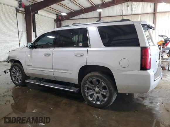 2017 Chevrolet Tahoe Premier z VIN 1GNSKCKC7HR140749, wystawiony jako Copart lot #70206795 z przebiegiem 132 107 mil mil oraz Szkoda całkowita • Salvage title. Historia ofert i sprzedaży dostępna na DreamBid. Obrazek 2.