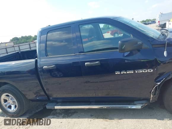 2012 Ram 1500 ST with VIN 1C6RD6FK1CS228130, listed as a IAAI auction lot 42397730 with 136,092 mi miles and . Bid and sale history available at DreamBid. Image 13.