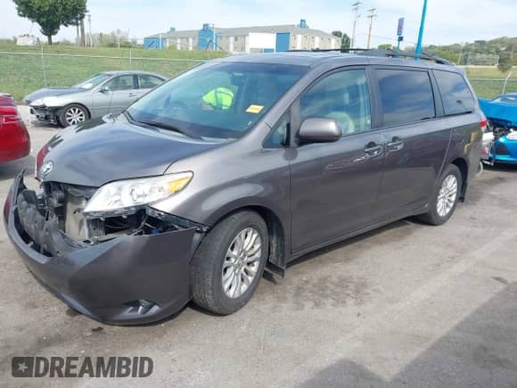2013 Toyota Sienna XLE AAS with VIN 5TDYK3DC4DS378960, listed as a IAAI auction lot 43352181 with 160,236 mi miles and . Bid and sale history available at DreamBid. Image 2.