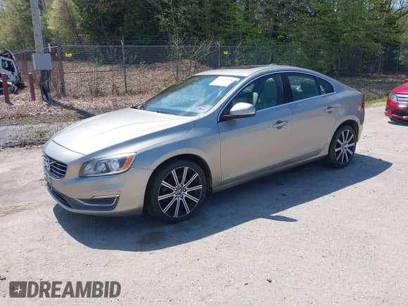 2015 Volvo S60 T5 Drive-E Premier with VIN YV126MFB8F2302747, listed as a IAAI auction lot 42247878 with 95,591 mi miles and . Bid and sale history available at DreamBid. Image 2.