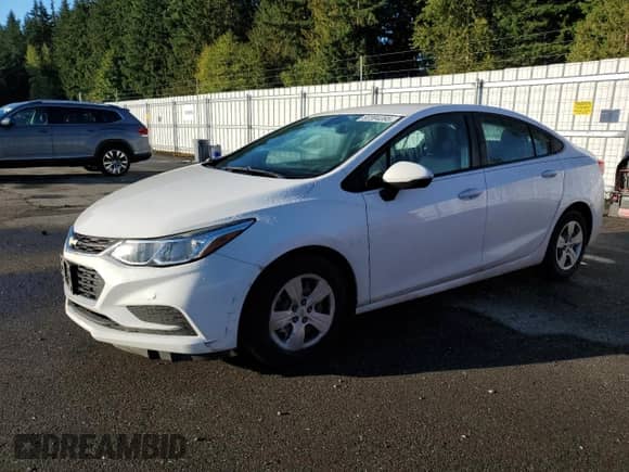 2017 Chevrolet Cruze LS with VIN 1G1BC5SM2H7241129, listed as a Copart auction lot 82394395 with 83,491 mi miles and Salvage title. Bid and sale history available at DreamBid. Image 1.