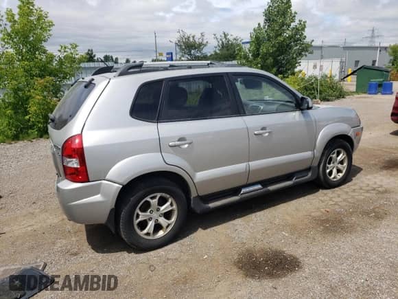 2009 Hyundai Tucson with VIN KM8JM12DX9U147832, listed as a Copart auction lot 61603545 with Not provided miles and Salvage title. Bid and sale history available at DreamBid. Image 3.