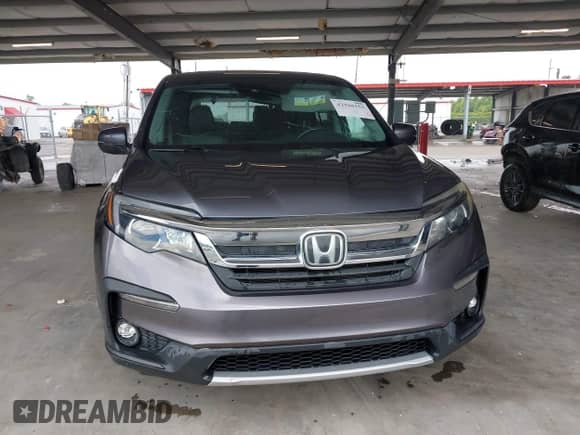 2019 Honda Pilot EX-L with VIN 5FNYF5H56KB041767, listed as a IAAI auction lot 42948153 with 162,074 mi miles and . Bid and sale history available at DreamBid. Image 12.