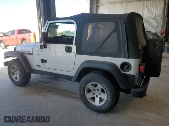 2003 Jeep Wrangler Rubicon с VIN 1J4FA69S23P375067, выставлен на аукционе Copart как лот 82678265 с пробегом 127 304 миль миль и Чистый • Clean title. История ставок и продаж доступна на DreamBid. Изображение 2.