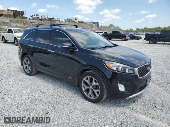 2018 Kia Sorento SX z VIN 5XYPKDA51JG419982, wystawiony jako Copart lot #69112165 z przebiegiem 133 773 mil mil oraz Szkoda całkowita • Salvage title. Historia ofert i sprzedaży dostępna na DreamBid. Obrazek 4.