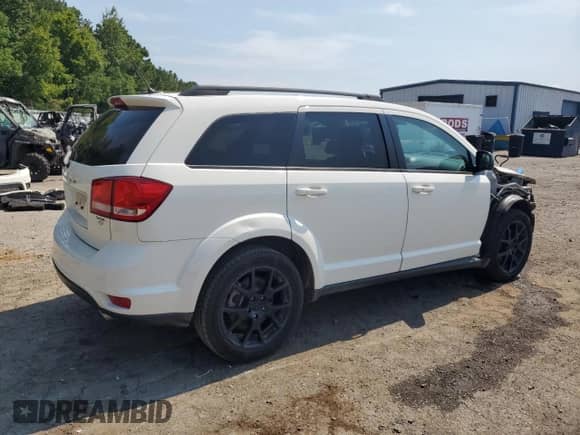 2016 Dodge Journey SXT with VIN 3C4PDDBG7GT216610, listed as a Copart auction lot 69681695 with 97,874 mi miles and Salvage title. Bid and sale history available at DreamBid. Image 3.