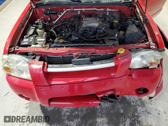 2003 Nissan Frontier XE с VIN 1N6ED29Y53C450340, выставлен на аукционе Copart как лот 87212254 с пробегом 257 975 миль миль и Списание • Salvage title. История ставок и продаж доступна на DreamBid. Изображение 11.