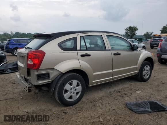 2009 Dodge Caliber SE with VIN 1B3HB28AX9D152123, listed as a Copart auction lot 67595245 with 108,562 mi miles and Salvage title. Bid and sale history available at DreamBid. Image 3.