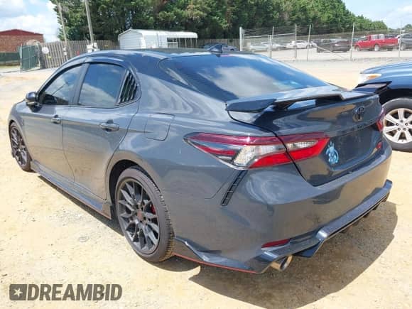2024 Toyota Camry TRD with VIN 4T1KZ1AK6RU104093, listed as a IAAI auction lot 42639834 with 7,454 mi miles and . Bid and sale history available at DreamBid. Image 3.