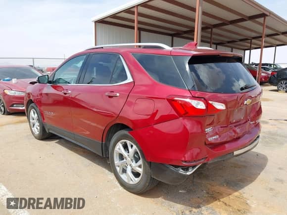 2021 Chevrolet Equinox Premier with VIN 2GNAXXEV4M6149948, listed as a IAAI auction lot 41856393 with 75,136 mi miles and . Bid and sale history available at DreamBid. Image 3.