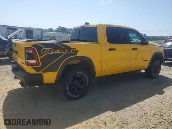 2023 Ram 1500 Rebel with VIN 1C6SRFLT5PN695135, listed as a Copart auction lot 65928305 with 11,152 mi miles and Salvage title. Bid and sale history available at DreamBid. Image 3.