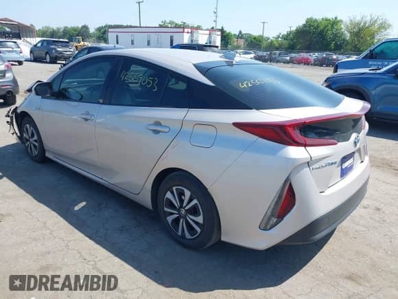 2018 Toyota Prius Plus z VIN JTDKARFP0J3075649, wystawiony jako IAAI lot #42569053 z przebiegiem 99 581 mil mil oraz . Historia ofert i sprzedaży dostępna na DreamBid. Obrazek 3.