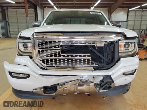 2016 GMC Sierra 1500 Denali z VIN 3GTU2PEJ1GG221537, wystawiony jako Copart lot #80850875 z przebiegiem Nie podano mil oraz Szkoda całkowita • Salvage title. Historia ofert i sprzedaży dostępna na DreamBid. Obrazek 5.