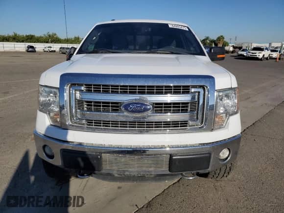 2013 Ford F-150 XLT with VIN 1FTFW1ET4DKD48542, listed as a Copart auction lot 84993475 with 153,819 mi miles and Salvage title. Bid and sale history available at DreamBid. Image 5.
