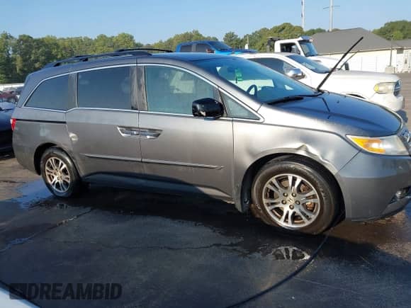 2013 Honda Odyssey EX с VIN 5FNRL5H41DB033471, выставлен на аукционе IAAI как лот 43274449 с пробегом 214 131 миль миль и . История ставок и продаж доступна на DreamBid. Изображение 13.