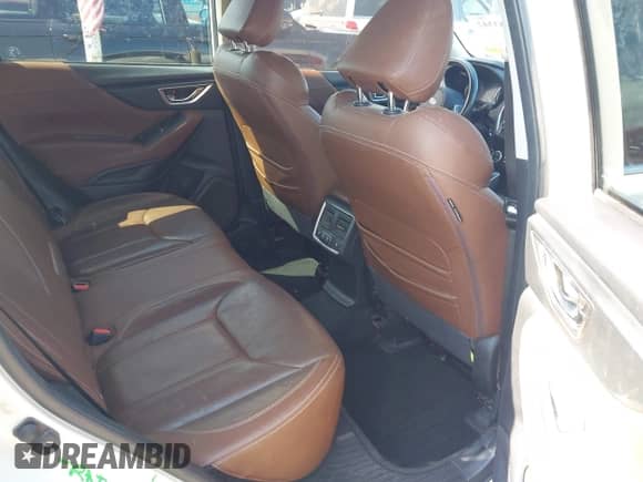 2020 Subaru Forester Touring with VIN JF2SKAXCXLH493203, listed as a IAAI auction lot 42983342 with 109,124 mi miles and . Bid and sale history available at DreamBid. Image 8.