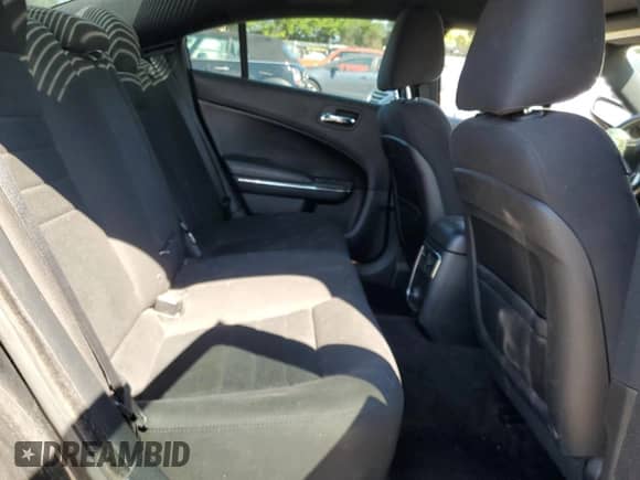 2013 Dodge Charger SE z VIN 2C3CDXBG2DH668571, wystawiony jako Copart lot #70055045 z przebiegiem 126 909 mil mil oraz Szkoda całkowita • Salvage title. Historia ofert i sprzedaży dostępna na DreamBid. Obrazek 10.