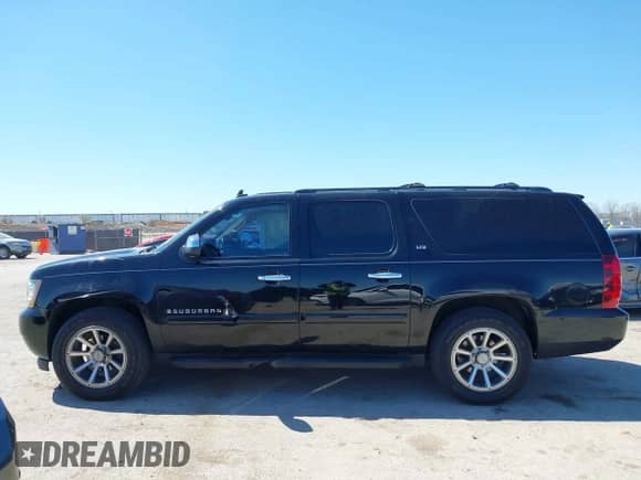 2008 Chevrolet Suburban 2LT z VIN 3GNFK16368G215490, wystawiony jako IAAI lot #41849979 z przebiegiem 195 184 mil mil oraz . Historia ofert i sprzedaży dostępna na DreamBid. Obrazek 14.