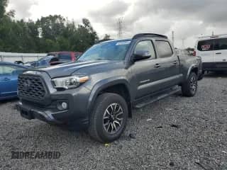2021 Toyota Tacoma SR5 с VIN 3TMBZ5DN9MM029596, выставлен на аукционе Copart как лот 82180865 с пробегом 68 238 миль миль и Списание • Salvage title. История ставок и продаж доступна на DreamBid. Изображение 1.