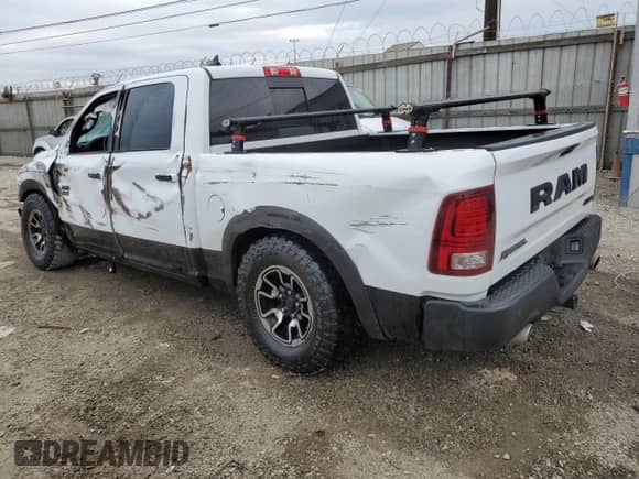 2018 Ram 1500 Rebel с VIN 1C6RR7YT7JS235965, выставлен на аукционе Copart как лот 84749674 с пробегом 61 484 миль миль и Списание • Salvage title. История ставок и продаж доступна на DreamBid. Изображение 2.