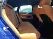 2024 BMW i4 M50 with VIN WBY33AW0XRFT10327, listed as a Copart auction lot 64826705 with 4,697 mi miles and Salvage title. Bid and sale history available at DreamBid. Image 10.