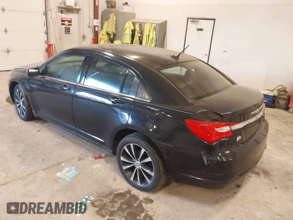 2013 Chrysler 200 Touring with VIN 1C3CCBBG4DN728461, listed as a IAAI auction lot 43374442 with 174,490 mi miles and . Bid and sale history available at DreamBid. Image 3.