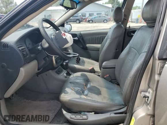 2003 Saturn LS with VIN 1G8JU54F13Y542759, listed as a Copart auction lot 69361245 with 248,378 mi miles and Salvage title. Bid and sale history available at DreamBid. Image 7.