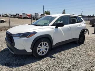 2022 Toyota Corolla Cross L with VIN 7MUAAABG5NV035127, listed as a Copart auction lot 64865595 with 29,777 mi miles and Salvage title. Bid and sale history available at DreamBid. Image 1.