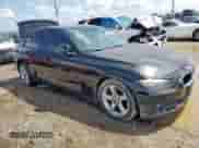 2014 BMW 3 Series 320i with VIN WBA3B1C59EK134700, listed as a Copart auction lot 60987785 with 149,684 mi miles and Salvage title. Bid and sale history available at DreamBid. Image 4.