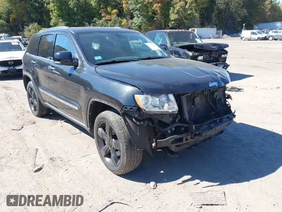 2013 Jeep Grand Cherokee Limited z VIN 1C4RJFBT8DC657129, wystawiony jako IAAI lot #43372561 z przebiegiem 157 836 mil mil oraz . Historia ofert i sprzedaży dostępna na DreamBid. Obrazek 1.