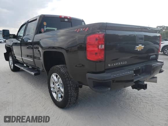 2018 Chevrolet Silverado 2500HD High Country с VIN 1GC1KXEY2JF288673, выставлен на аукционе Copart как лот 45281803 с пробегом Не указан миль и На запчасти • Non repairable. История ставок и продаж доступна на DreamBid. Изображение 2.