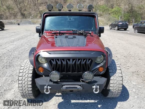 2012 Jeep Wrangler Sport with VIN 1C4AJWAG7CL105511, listed as a Copart auction lot 54671835 with 137,362 mi miles and Clean title. Bid and sale history available at DreamBid. Image 5.