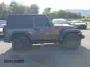 2024 Jeep Wrangler Sport S z VIN 1C4PJXAN9RW117133, wystawiony jako IAAI lot #42497915 z przebiegiem 9 754 mil mil oraz . Historia ofert i sprzedaży dostępna na DreamBid. Obrazek 13.