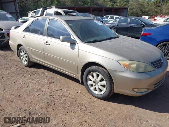 2004 Toyota Camry XLE with VIN 4T1BE32KX4U264265, listed as a IAAI auction lot 43513716 with 300,064 mi miles and . Bid and sale history available at DreamBid. Image 1.