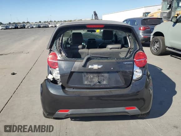 2015 Chevrolet Spark LT с VIN KL8CD6S94FC729635, выставлен на аукционе Copart как лот 80916685 с пробегом 99 004 миль миль и Списание • Salvage title. История ставок и продаж доступна на DreamBid. Изображение 6.