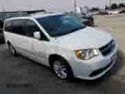 2014 Dodge Grand Caravan SXT 30th Anniversary with VIN 2C4RDGCG7ER184153, listed as a Copart auction lot 64866445 with 193,640 mi miles and Clean title. Bid and sale history available at DreamBid. Image 4.
