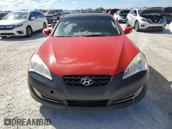 2011 Hyundai Genesis Coupe Track z VIN KMHHU6KHXBU052434, wystawiony jako Copart lot #77558364 z przebiegiem Nie podano mil oraz Szkoda całkowita • Salvage title. Historia ofert i sprzedaży dostępna na DreamBid. Obrazek 5.