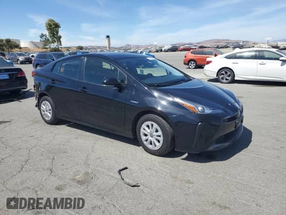 2020 Toyota Prius L Eco with VIN JTDKARFU5L3126006, listed as a Copart auction lot 71543415 with 109,521 mi miles and Salvage title. Bid and sale history available at DreamBid. Image 4.