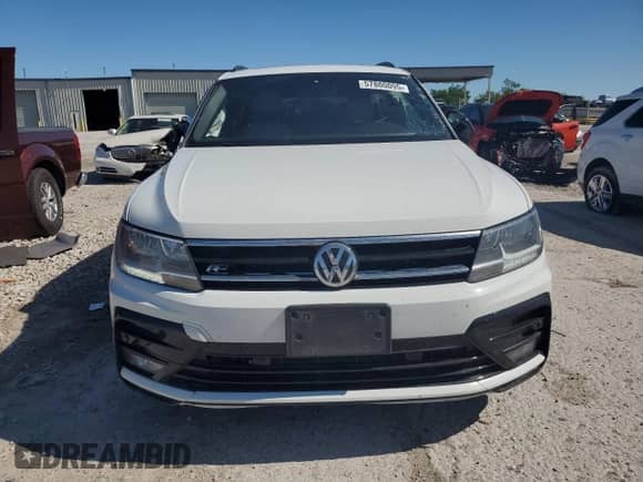 2020 Volkswagen Tiguan SE z VIN 3VV2B7AX5LM119060, wystawiony jako Copart lot #57800095 z przebiegiem 106 379 mil mil oraz Szkoda całkowita • Salvage title. Historia ofert i sprzedaży dostępna na DreamBid. Obrazek 5.