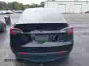 2022 Tesla Model Y Long Range z VIN 7SAYGDEE0NF385324, wystawiony jako IAAI lot #43128196 z przebiegiem 64 655 mil mil oraz . Historia ofert i sprzedaży dostępna na DreamBid. Obrazek 16.
