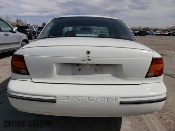 2001 Saturn SL with VIN 1G8ZF52861Z269133, listed as a Copart auction lot 51060915 with 213,562 mi miles and Salvage title. Bid and sale history available at DreamBid. Image 6.