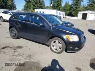 2009 Dodge Caliber SXT z VIN 1B3HB48A39D130816, wystawiony jako Copart lot #82270345 z przebiegiem 106 380 mil mil oraz Szkoda całkowita • Salvage title. Historia ofert i sprzedaży dostępna na DreamBid. Obrazek 4.