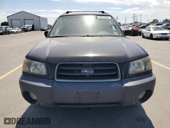 2005 Subaru Forester X with VIN JF1SG63685H719809, listed as a Copart auction lot 66223865 with 128,149 mi miles and Salvage title. Bid and sale history available at DreamBid. Image 5.