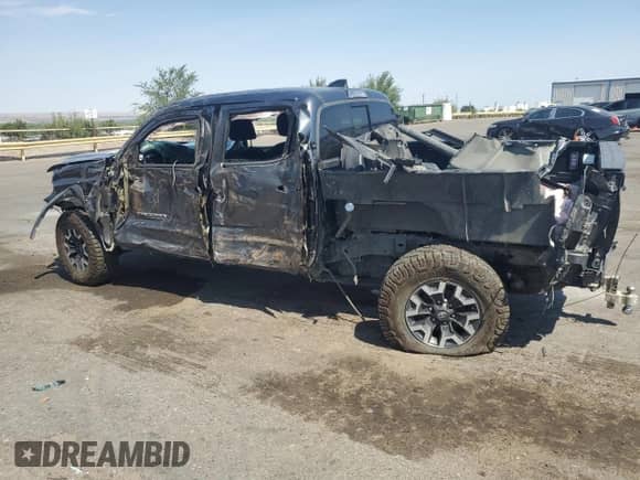 2020 Toyota Tacoma SR5 with VIN 3TMCZ5AN6LM306812, listed as a Copart auction lot 67223955 with 90,130 mi miles and Salvage title. Bid and sale history available at DreamBid. Image 2.