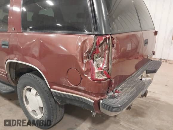 1998 Chevrolet Tahoe with VIN 1GNEK13RXWJ330934, listed as a IAAI auction lot 41431736 with 269,137 mi miles and . Bid and sale history available at DreamBid. Image 6.