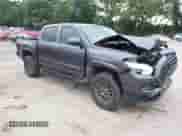 2020 Toyota Tacoma SR with VIN 3TMCZ5AN4LM314973, listed as a IAAI auction lot 42955800 with 94,693 mi miles and . Bid and sale history available at DreamBid. Image 1.