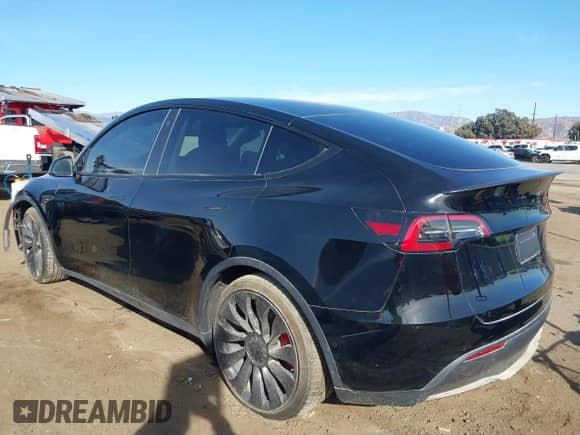 2022 Tesla Model Y Performance with VIN 7SAYGDEF7NF516418, listed as a IAAI auction lot 43222998 with 26,525 mi miles and . Bid and sale history available at DreamBid. Image 3.
